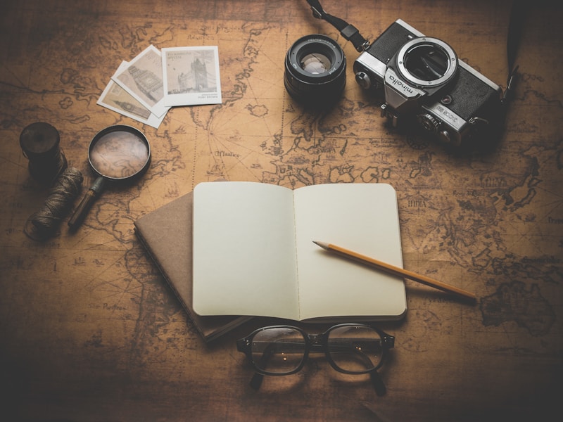 planning trip on a budget map and passport